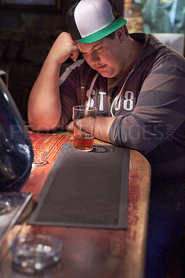 Buy stock photo Beer, pub alcohol and sad man depression over emotional crisis, worry or health risk at restaurant, diner or bar. Plus size, drink and drunk person depressed over fail, lonely or thinking of decision