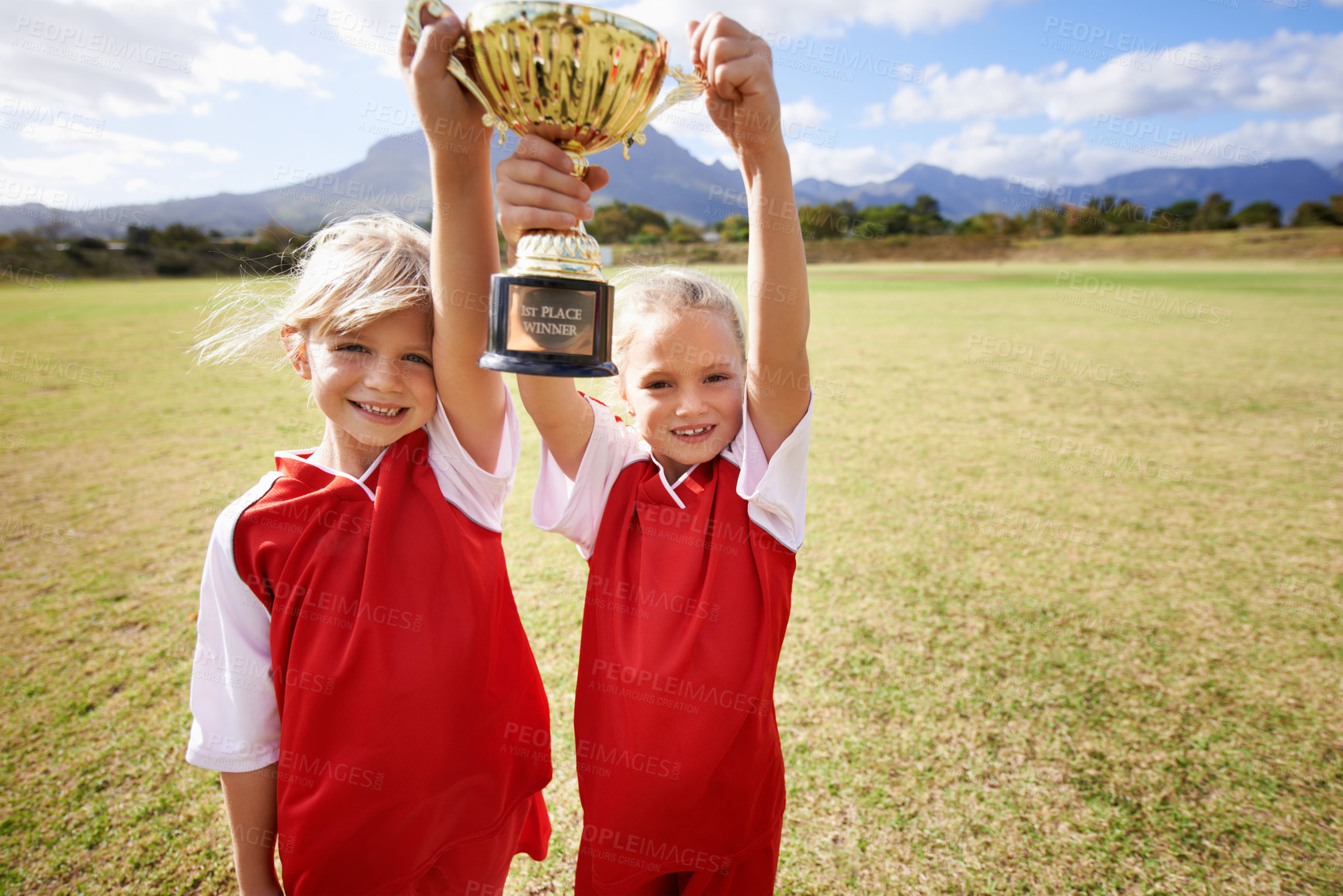 Buy stock photo Celebration, teammates and children with cup, boys and girls with victory, support or proud. Achievement, sports and friendship, together and happy for win, ready for game or physical activity
