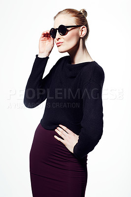 Buy stock photo Woman, sunglasses for beauty or fashion, cosmetic care and wellness with protection from sun on white background. Black eyewear, casual clothes and pose in studio with makeup, eye care and confidence
