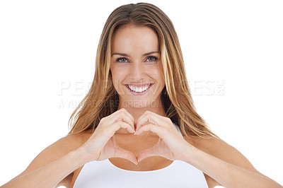 Buy stock photo Portrait, hand and heart by woman in studio happy, relax and smile against a white background. Face, love and emoji by girl showing shape with hands for care, peace and kindness on isolated space