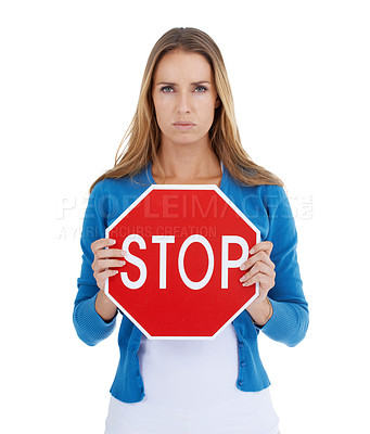 Buy stock photo Woman, studio portrait and holding stop sign in hands for serious, assertive or angry face by white background. Activist model, stop and anger for equality, transparency or isolated for woman rights