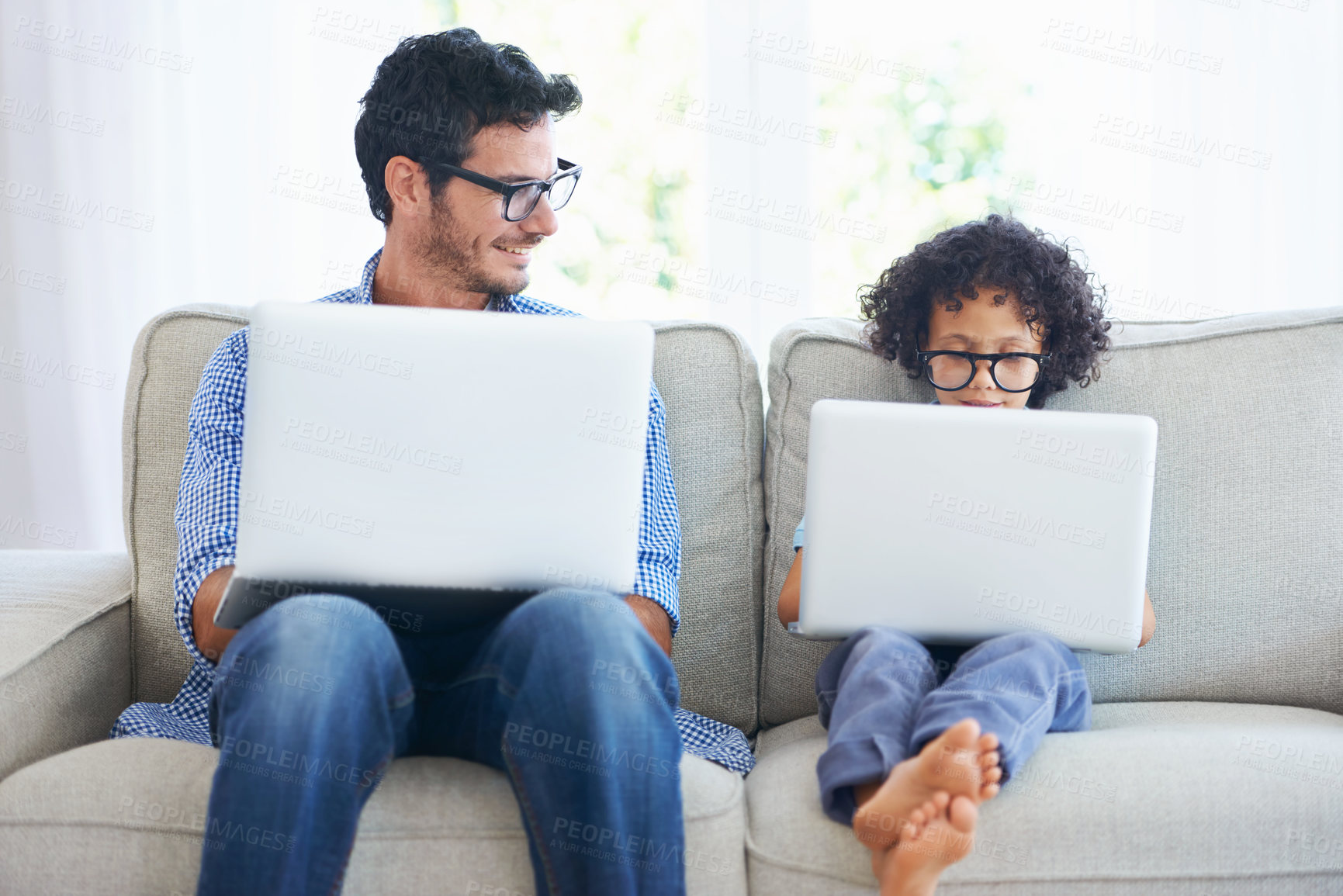 Buy stock photo Laptop, relax and family father, child or people sitting on home sofa, search online website or typing internet research. Elearning, remote education and happy man enjoy bonding quality time with kid