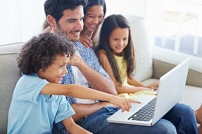 Buy stock photo Laptop, pointing and happy family dad, kids or people gesture at online website, social network video or comic. Smile, adoption and group of children with father streaming home subscription movie