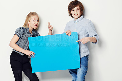 Buy stock photo Shot of two young kids holding copy
space