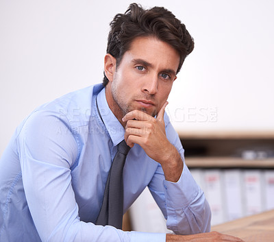 Buy stock photo Businessman, portrait and confident professional thinking in office, relaxing and career pride in workplace. Male person, face and startup or entrepreneur, positive and planning for future company