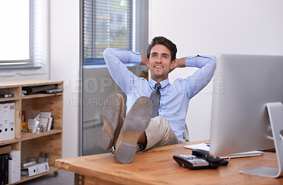 Buy stock photo Smile, relax or happy man in office thinking of break for mental health, pride or wellness at desk. Calm, business or confident male employee with peace or hand behind his head stretching or resting