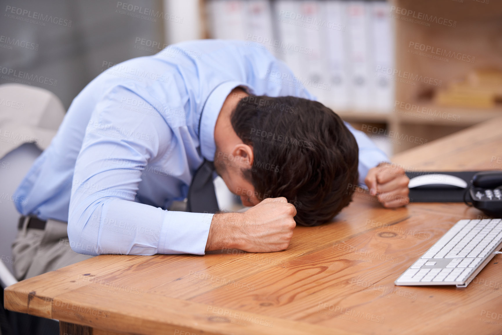 Buy stock photo Business man, stress and resting on desk, burnout and mental health or overworked in workplace. Male professional, frustration and banging table in anger, bankrupt and overwhelming debt or pressure