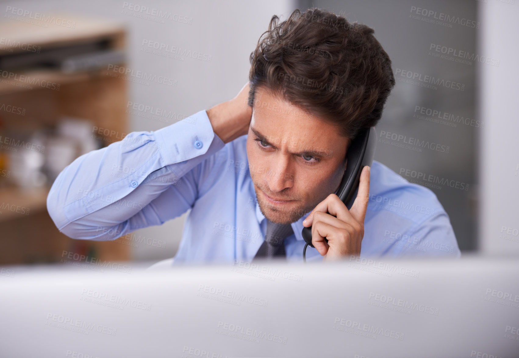 Buy stock photo Cropped shot of a handsome young businessman talking on the phone