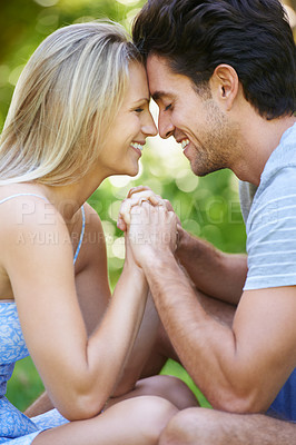 Buy stock photo Romance, love or happy couple holding hands in nature for date, support or care on a summer in park together. Relax, man or woman on outdoor holiday vacation for bond, travel or freedom in Australia