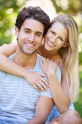 Buy stock photo Couple, hug and portrait in park with smile, love and commitment in healthy relationship. People on date outdoor, happiness and care with trust, partner and bonding together for marriage and romance