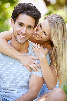 Buy stock photo Couple, hug and happy in park with smile, love and commitment in healthy relationship. People on a date outdoor, portrait and care with trust, partner and bonding together for marriage and romance