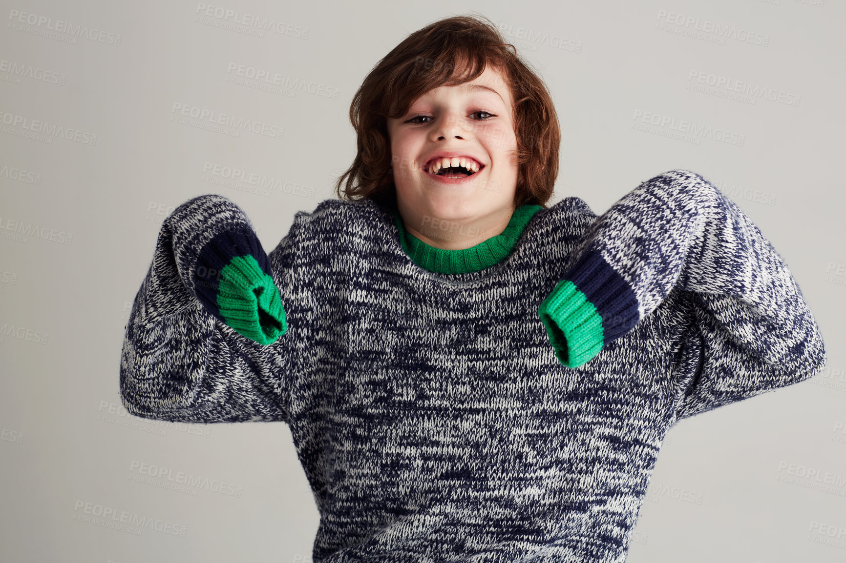 Buy stock photo Fashion, portrait and boy kid in a studio with casual, cool and stylish jersey outfit. Excited, smile and happy young child model with trendy youth style and positive attitude by gray background.