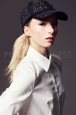 Buy stock photo Portrait of an attractive and stylish young woman posing in the studio