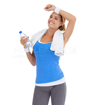 Buy stock photo Water bottle, sports and young woman in studio on break for exercise, training or workout. Smile, fitness and happy female person with hydration drink for weight loss isolated by white background.