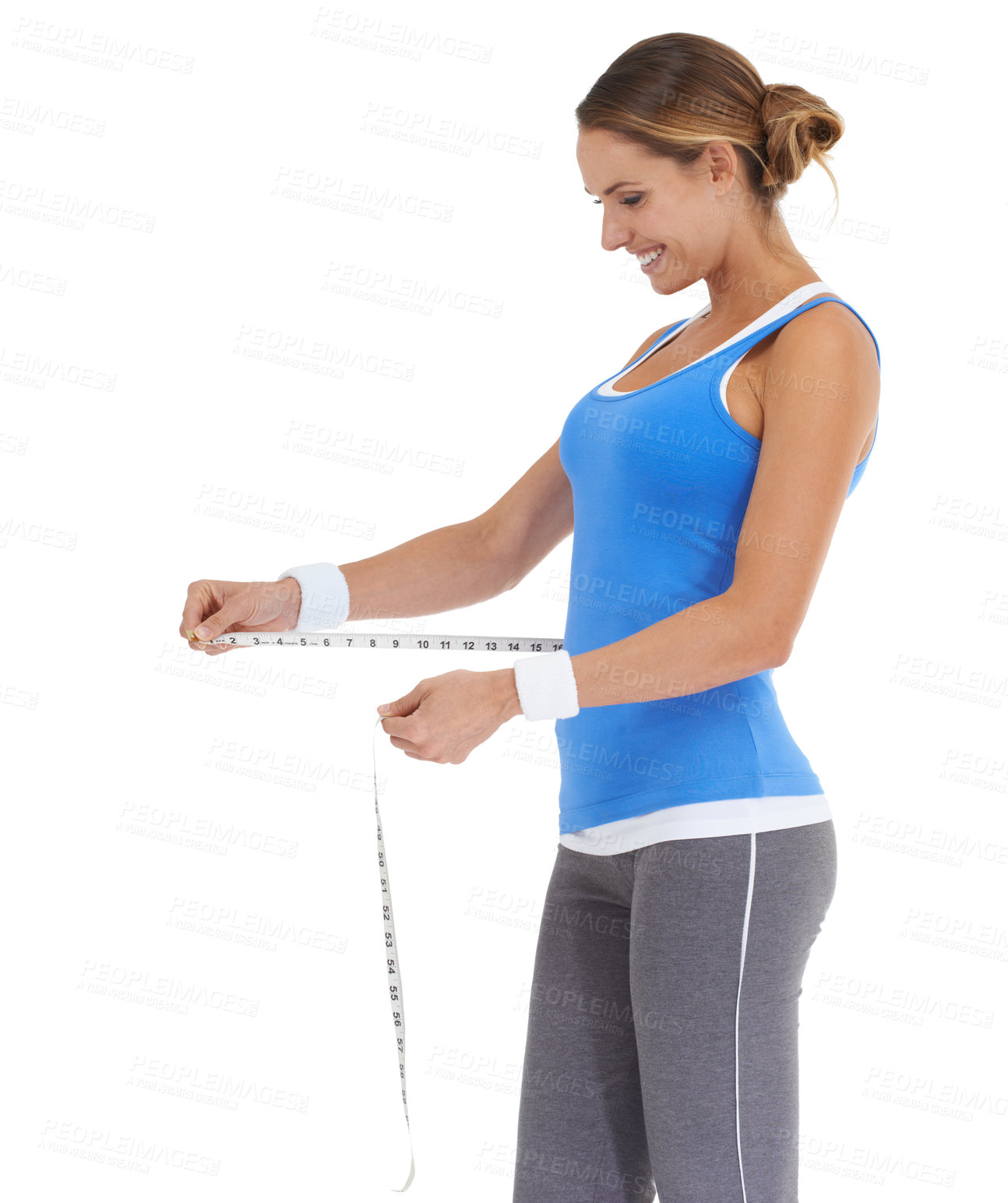 Buy stock photo Woman, stomach and measure tape in studio for fitness, weight loss or health results with training progress. Happy model or person check her waist for exercise or workout goals on a white background