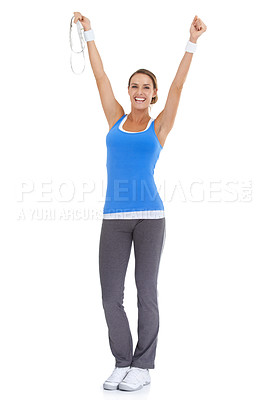 Buy stock photo Woman, workout success and celebration in studio with measure tape for exercise, fitness achievement or body goals. Model with fist and yes for results and training portrait on a white background