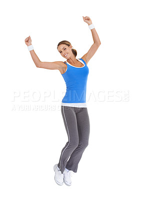 Buy stock photo Woman, jump and fitness celebration in studio for exercise success, workout achievement or body goals and dance. Sports model with fist, energy and portrait for training results on a white background