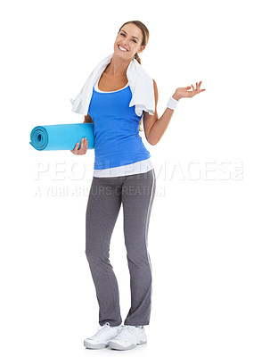 Buy stock photo Yoga mat, fitness and portrait of woman in studio with mockup space for exercise or workout. Happy, equipment and portrait of young female person with show gesture for sports by white background.