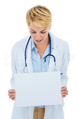 Buy stock photo A young female doctor holding up a blank placard