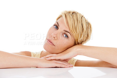 Buy stock photo Woman, portrait and relax with natural beauty isolated on a white studio background. Face of calm young female person, model or blonde resting head on hands in confidence with hair on mockup space