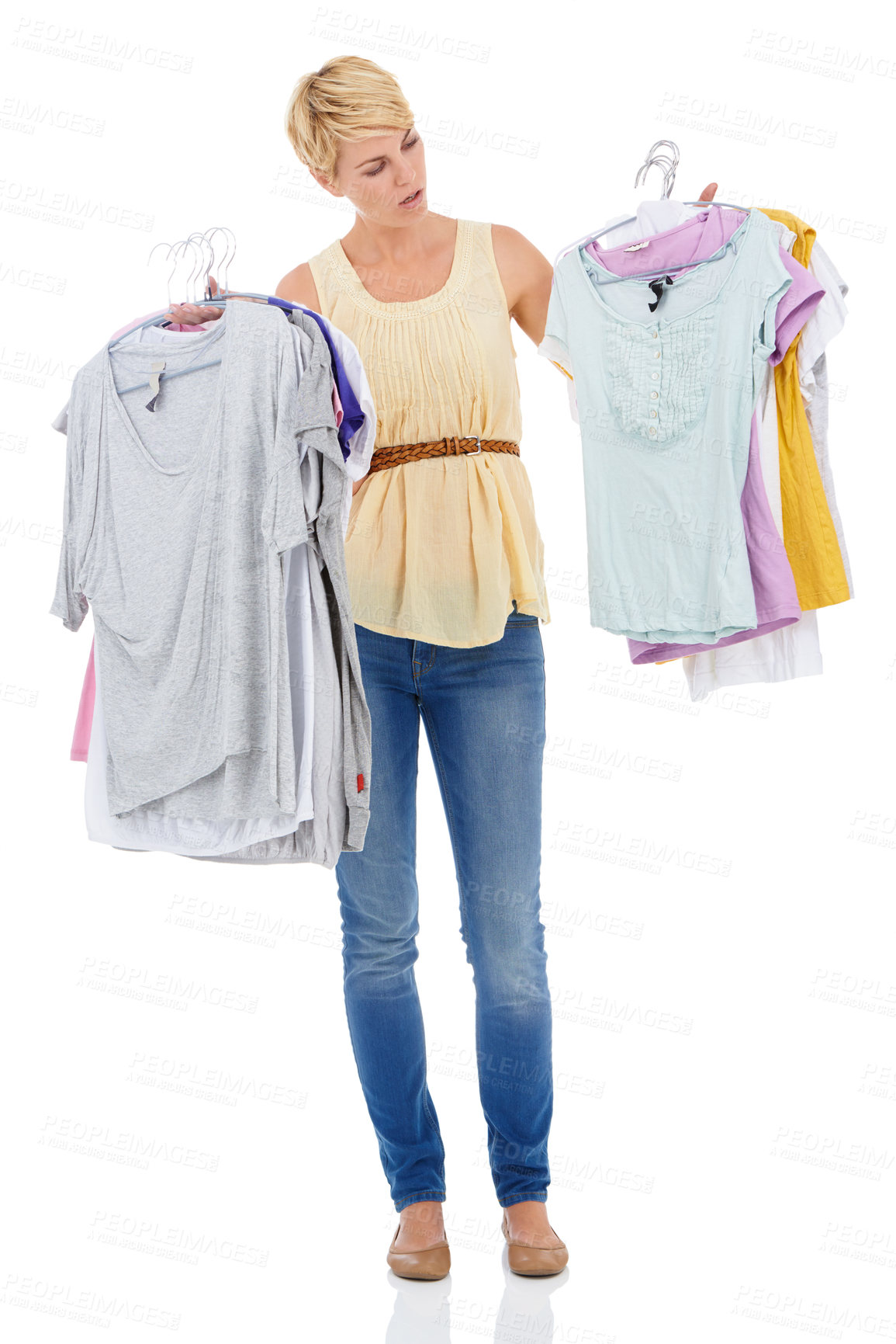Buy stock photo Woman, fashion and looking at clothing for choice, decision or selection on a white studio background. Female person, model or blonde thinking, wonder or picking garment or outfit for style on mockup