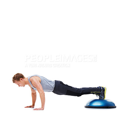 Buy stock photo Man, fitness and push ups with bosu ball for exercise, workout or training on a white studio background. Active male person lifting body weight for strength, muscle or strong arms on mockup space