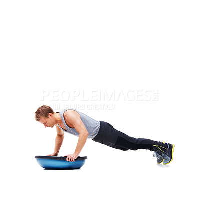 Buy stock photo Balance, exercise and man with bosu ball in workout, core training and push up on white background. Muscle, strength and power with challenge on mockup space, athlete and fitness tools in studio