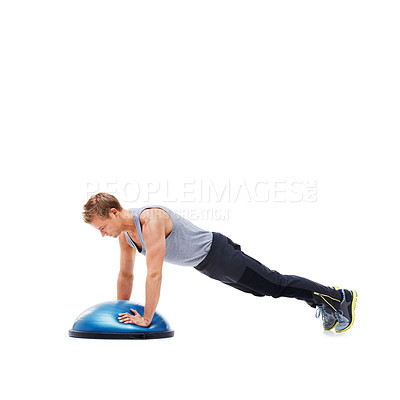 Buy stock photo Man, fitness and half ball for plank in studio for training, strong exercise and gym with muscle health on floor. Person or young sports model in shoulder or arms workout on a white background