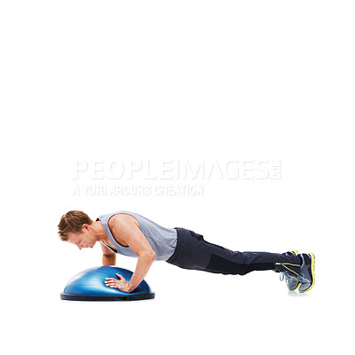 Buy stock photo Man, training and half ball for plank in studio for fitness, strong exercise and gym with muscle health on floor. Bodybuilder or young sports model with push up or arms workout on a white background