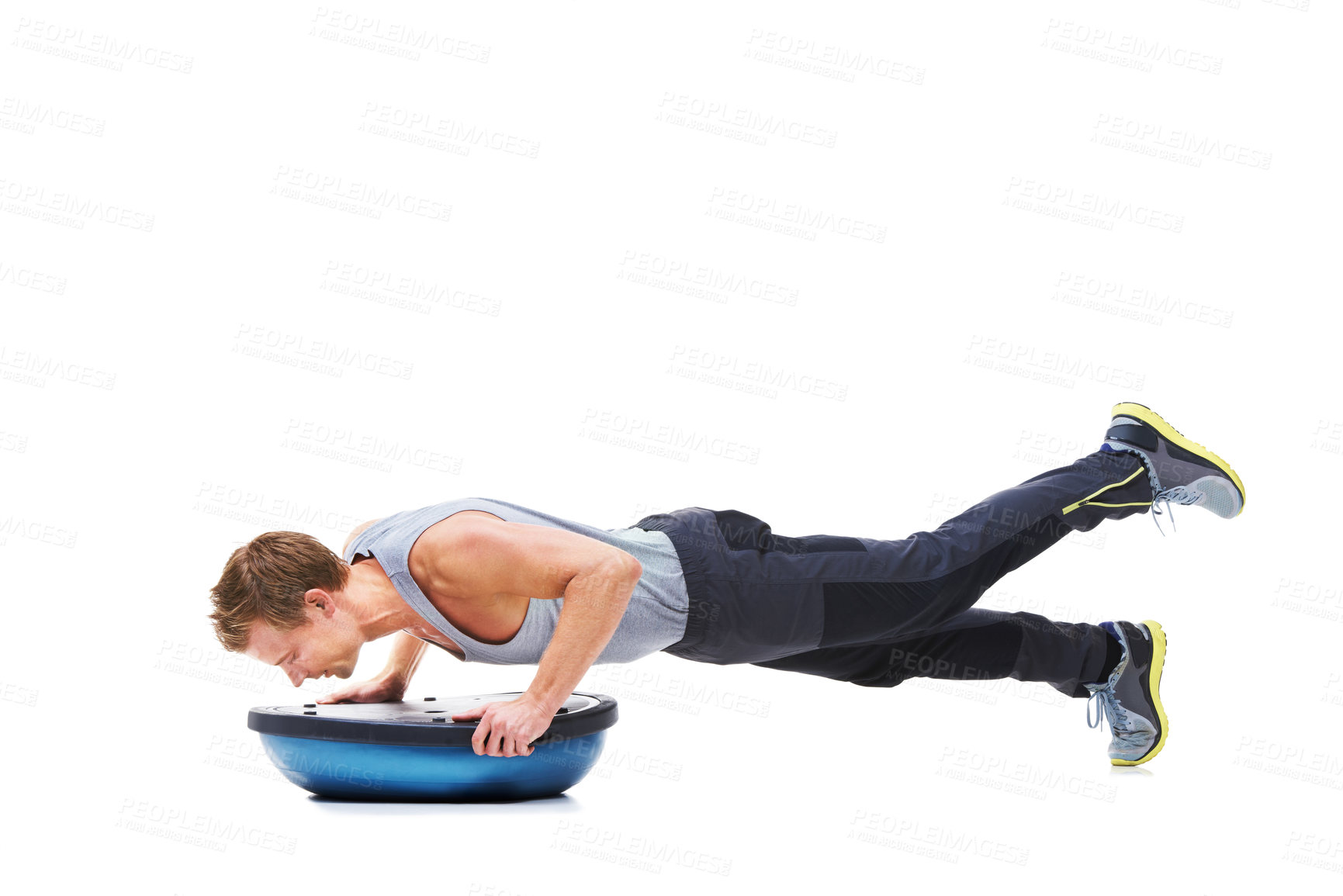 Buy stock photo Man, half ball and exercise or workout in studio, core strength and fitness challenge for wellness. Male person, athlete and equipment for training, mockup space and performance by white background