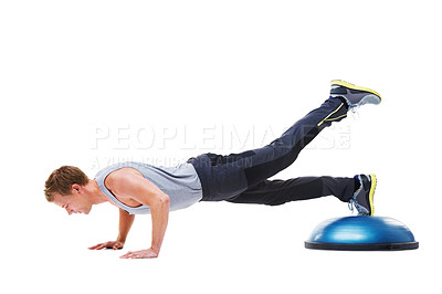 Buy stock photo Man, half ball and push up in studio for fitness, core strength and workout challenge for wellness. Male person, athlete and equipment for training, mockup space and performance by white background