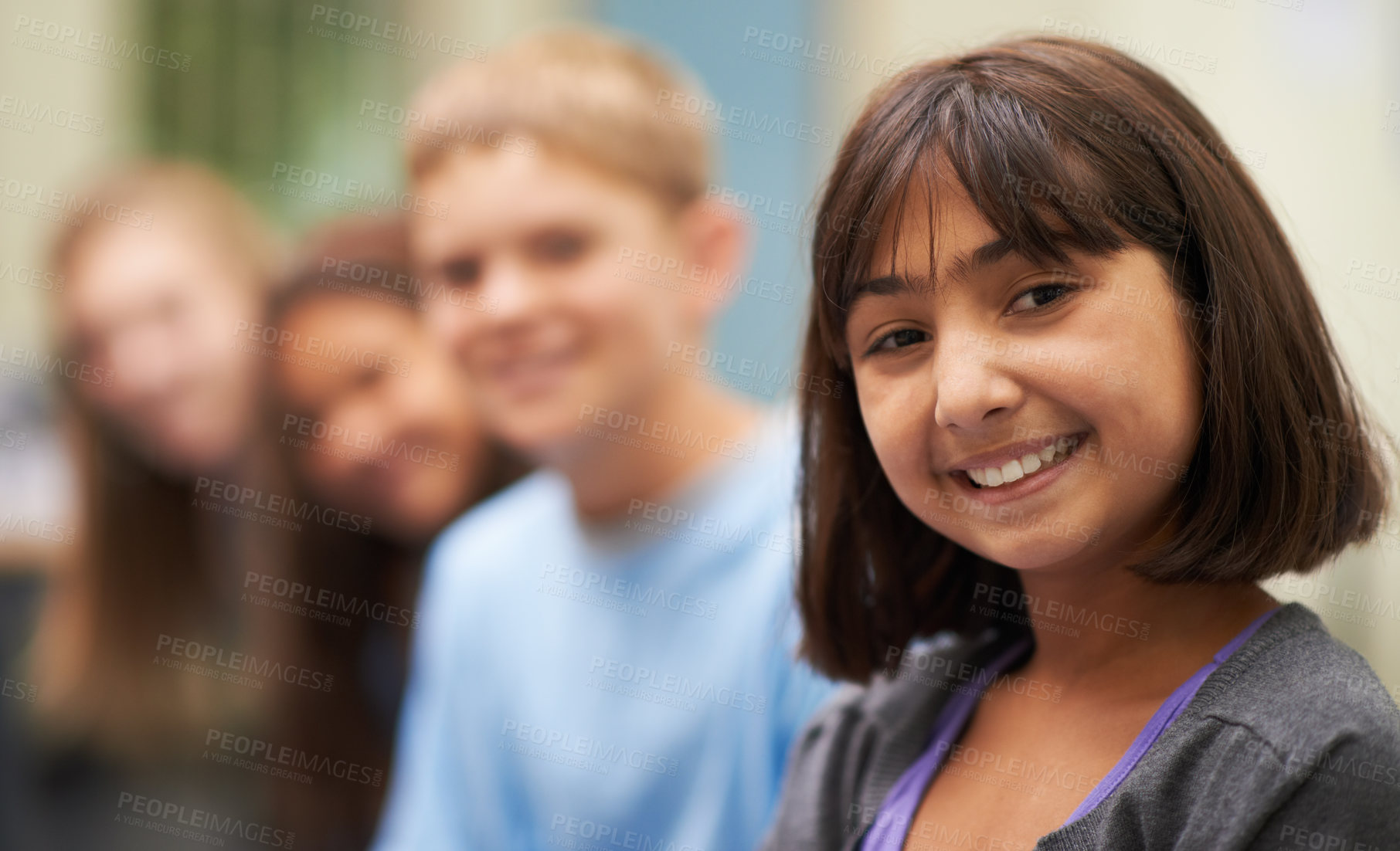 Buy stock photo Girl, portrait and happy in corridor at school with confidence and pride for learning, education or knowledge. Student, person or face with smile in building or hallway before class or ready to study