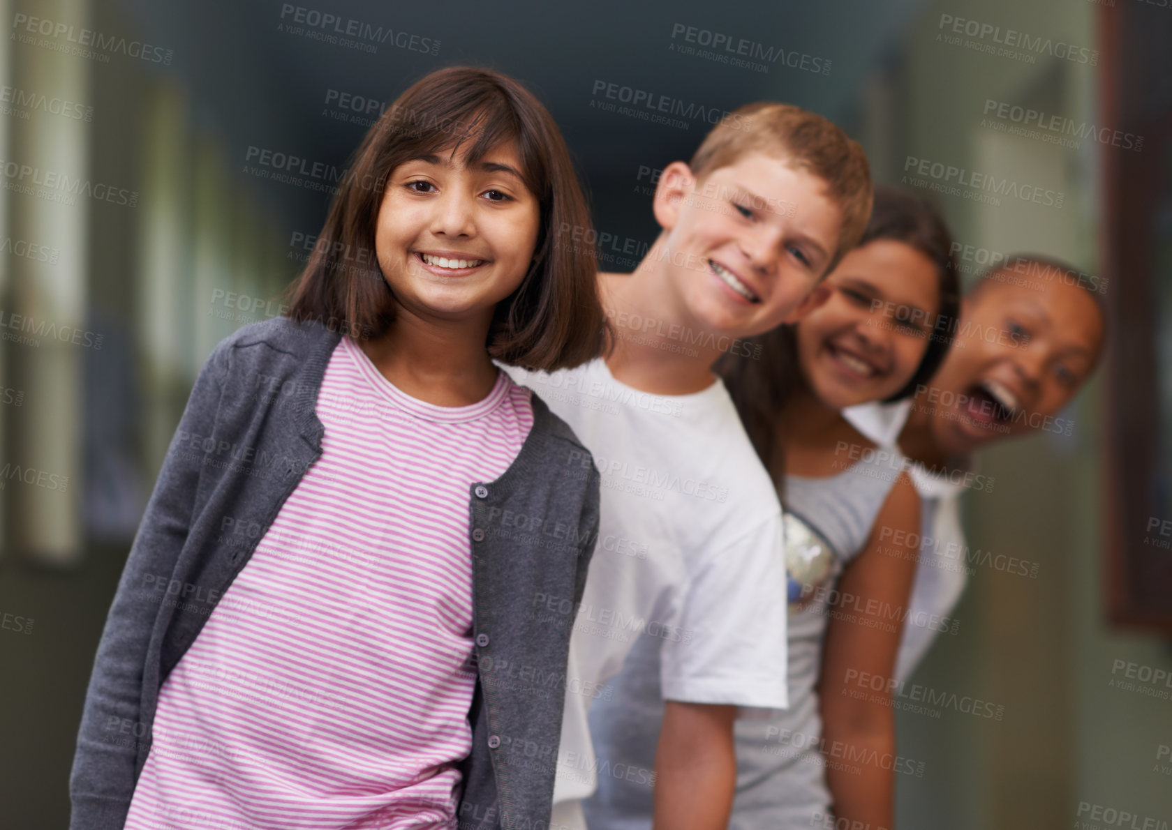 Buy stock photo Girl, portrait and friends in line at school with confidence and pride for learning, education or knowledge. Student, people and face with smile in building or hallway before class or ready to study