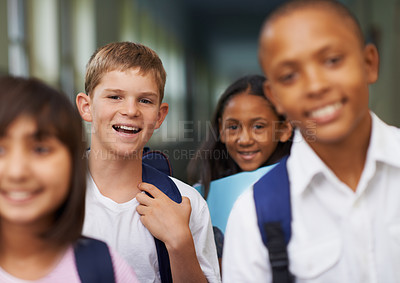 Buy stock photo Friends, portrait and happy in corridor of school with backpack for learning, education and knowledge. Student, person and face with smile in building before class or ready to study with diversity  