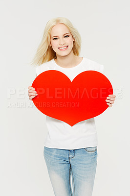 Buy stock photo Red heart, love and portrait of woman in studio for peace, self love and affection on white background. Shape, emoji and face of girl holding cardboard sign, loving and gesture with mockup space