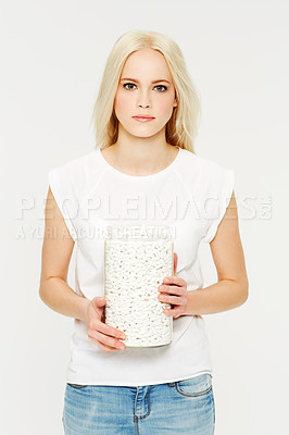 Buy stock photo Portrait, pills and medicine with a model woman holding a jar in studio on a gray background for healthcare. Medical, supplements and medication with a serious young female holding a glass container
