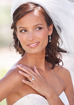 Buy stock photo A gorgeous young bride posing outdoors