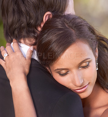 Buy stock photo Couple, unity and embrace on wedding day for love, support and together for marriage and commitment. People, romance and hugging at outdoor ceremony, loyalty and ring for devotion and partnership