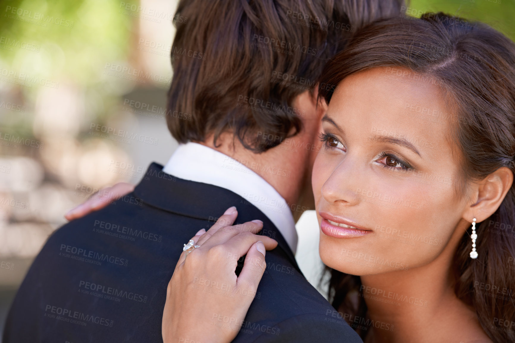 Buy stock photo Couple, marriage and embrace on wedding day for love, support and together for partnership and commitment. People, romance and hugging at outside ceremony, loyalty and union for devotion in outdoors