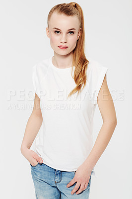 Buy stock photo Serious, portrait and teenager with fashion in studio and white background with confidence and pride. Beauty, face and girl with a ponytail in casual trendy style, jeans and relax in mock up space 