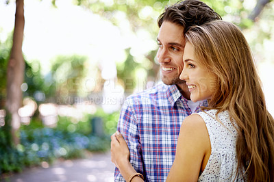 Buy stock photo Happy, love and couple at park for valentines date in summer celebration or romance. Young woman, partner or people smile and hug together in garden excited for anniversary in nature or outdoor