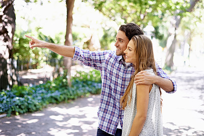 Buy stock photo Love, couple talking and in park for summer vacation, conversation and bird watching with happiness on Valentines day. Romance, man and woman in nature, walking and discussion with smile and loving