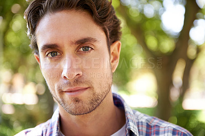 Buy stock photo Portrait, man and in park to relax, sunshine and happiness on weekend break, calm and peaceful. Face, male and gentleman in nature, forest and summer on vacation, casual day and guy outdoor with joy