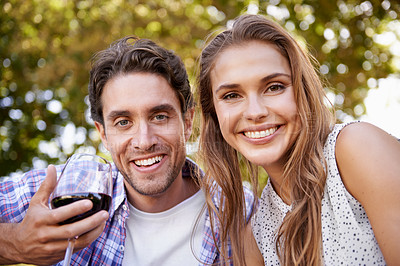 Buy stock photo Love couple, portrait or wine on picnic, valentines day or romance date bonding in nature park or garden low angle. Smile, happy woman or man and alcohol drinks glass in marriage anniversary security