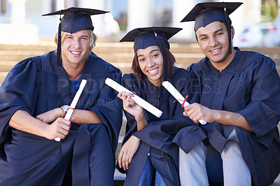 Buy stock photo Graduation, portrait and students on steps with certificate at university campus with smile, diversity and education. School, success and happy group of friends with diploma for academic achievement.