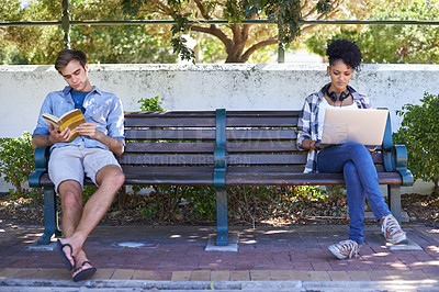 Buy stock photo College, campus and students in the park study on a bench with laptop, book and reading. University, academy and people sitting outdoor learning with research, project and knowledge for education