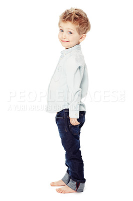 Buy stock photo Cute, smile and portrait of a child with fashion isolated on a white background in a studio. Adorable, happy and a little boy as a clothes model in jeans for youth with happiness and smiling