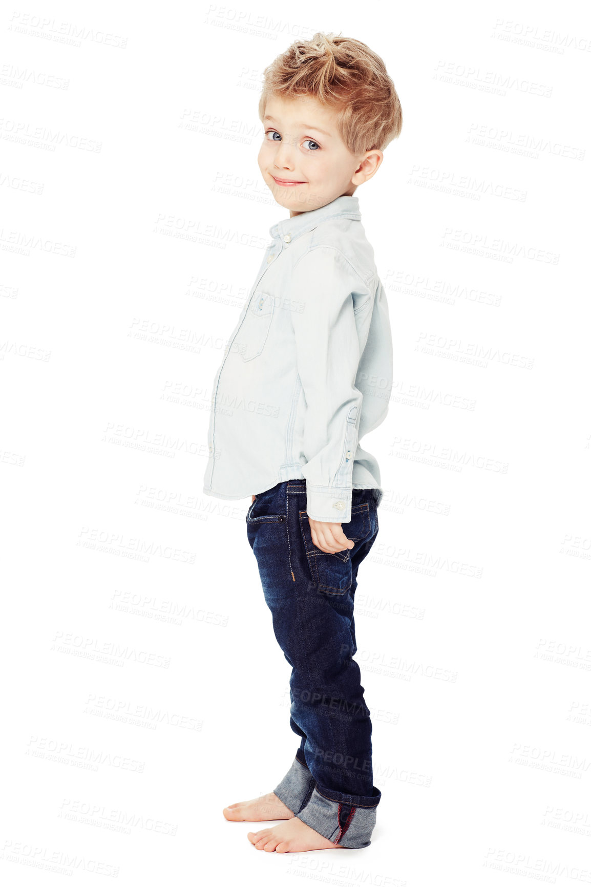 Buy stock photo Cute, smile and portrait of a child with fashion isolated on a white background in a studio. Adorable, happy and a little boy as a clothes model in jeans for youth with happiness and smiling