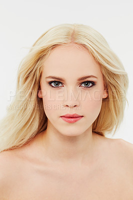 Buy stock photo Cosmetic, makeup and portrait of woman with beauty in white background of studio. Blonde, model and serious face with facial skincare, dermatology or hair care from salon or spa mock up space