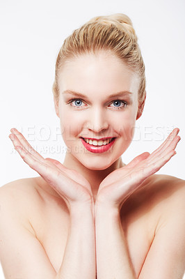 Buy stock photo Portrait of a smiling blonde caucasian woman with her hands framing her face